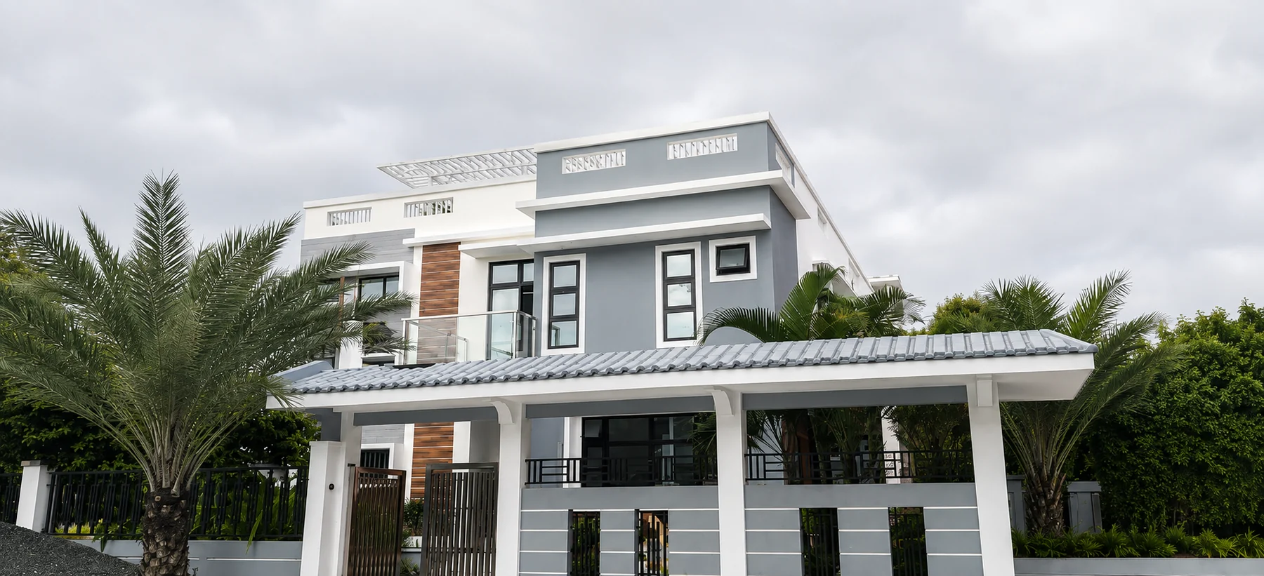Two-storey residential building with roof deck in San Francisco, Quezon